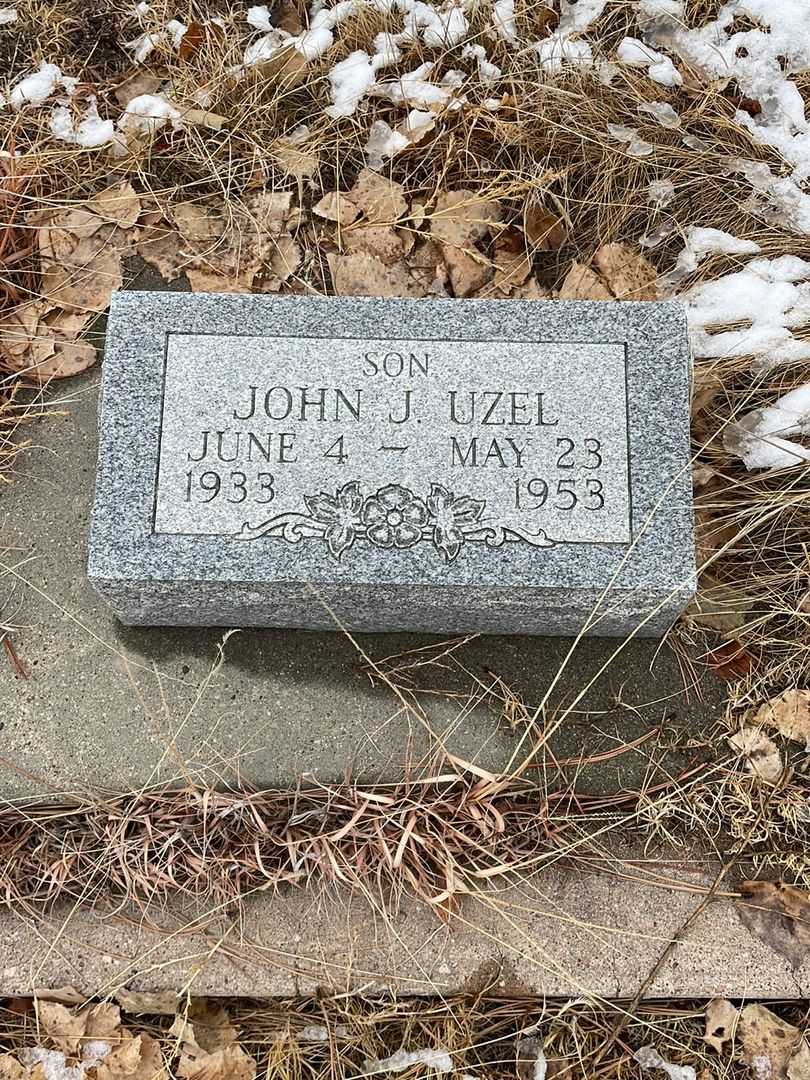 James E. Uzel's grave. Photo 4